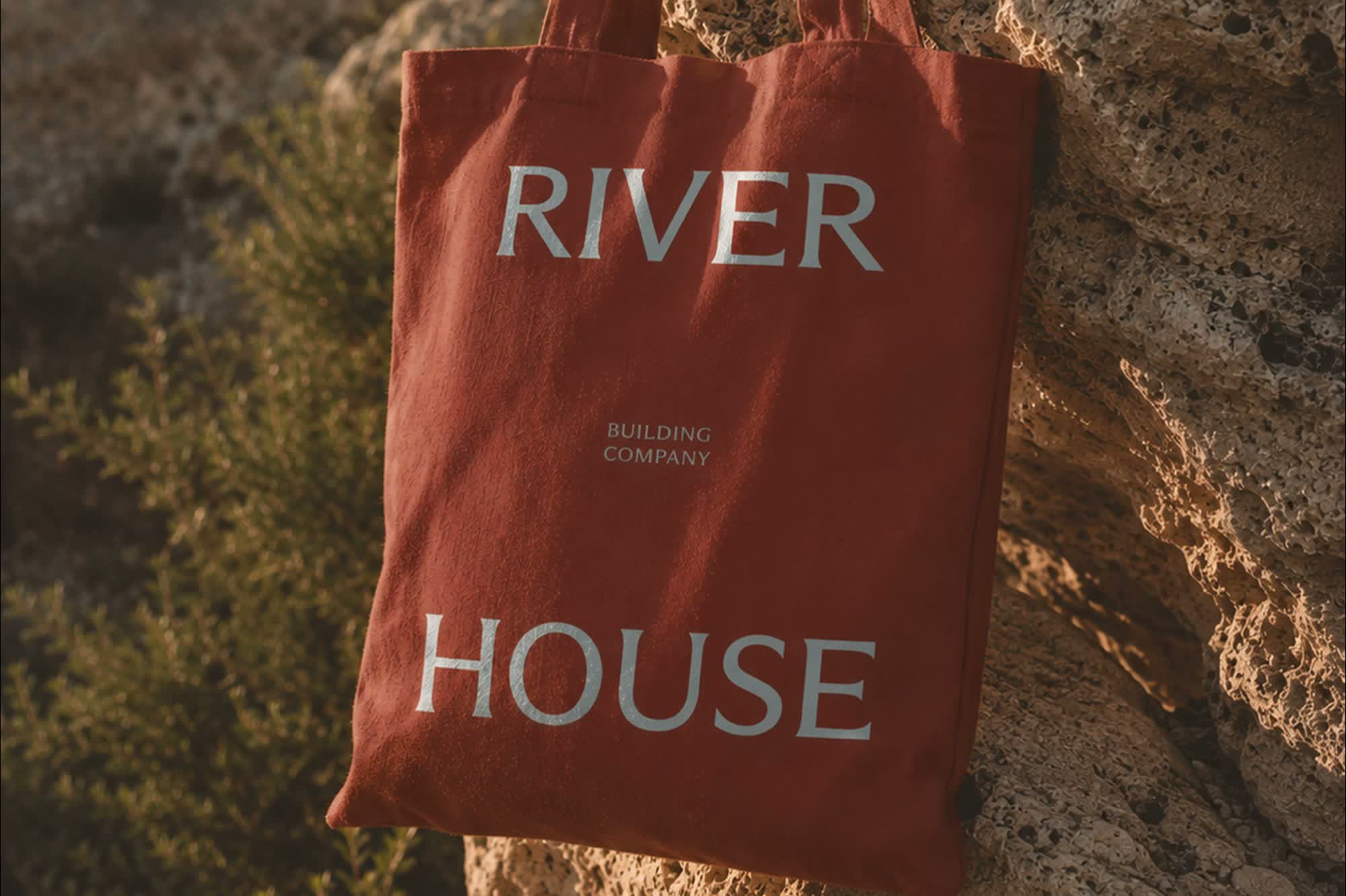 Studio Lisca gives River House an identity drawn from brick and river